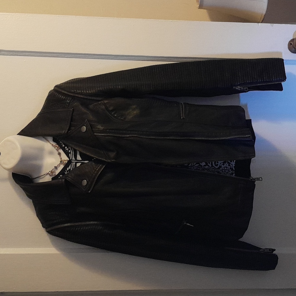 Trendy black vegan leather Moto Jacket. Size small.